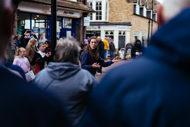 A local expert briefing travelers on the ground